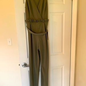 Adorable olive jumpsuit with a hidden deep V!
